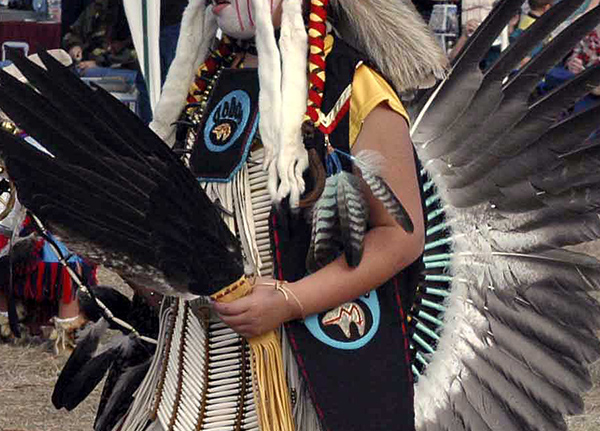 Person in traditional pow wow attire