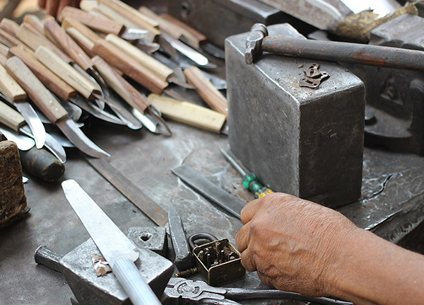 Person making knives
