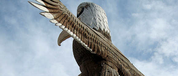 Carved totem pole of an eagle