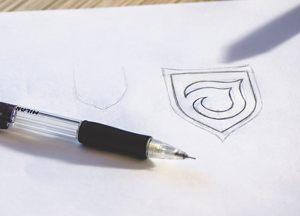 Logo sketch on scratch paper