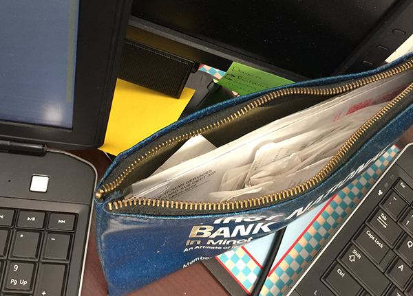 Bank bag filled with paper receipts