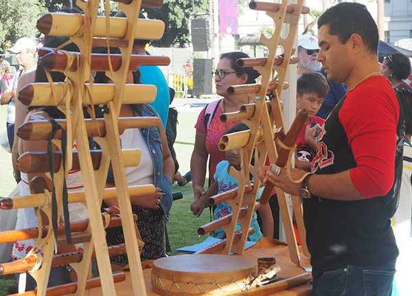 Man selling items at a craft fair