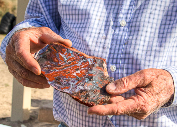 Hands holding a rock