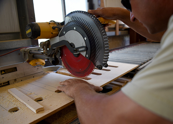 Person using circular saw