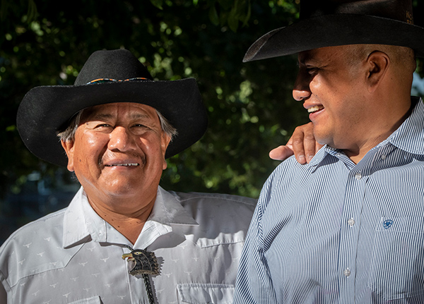 Two men smiling for the camera