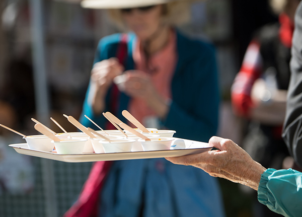 Person holding platter with samples