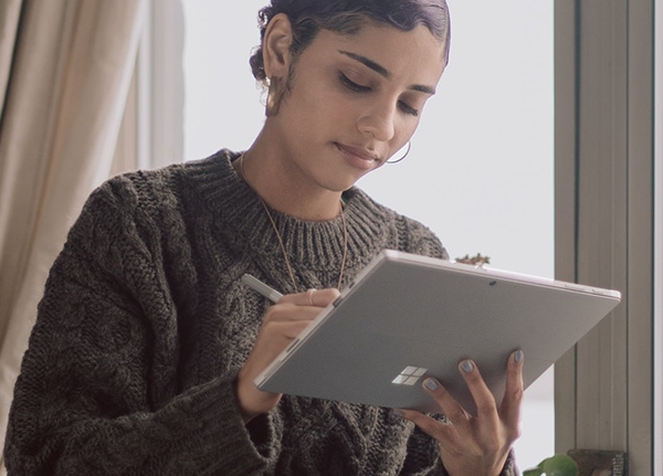 Woman using tablet computer