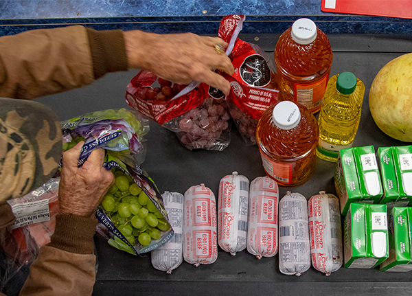 Grocery items on a checkout belt